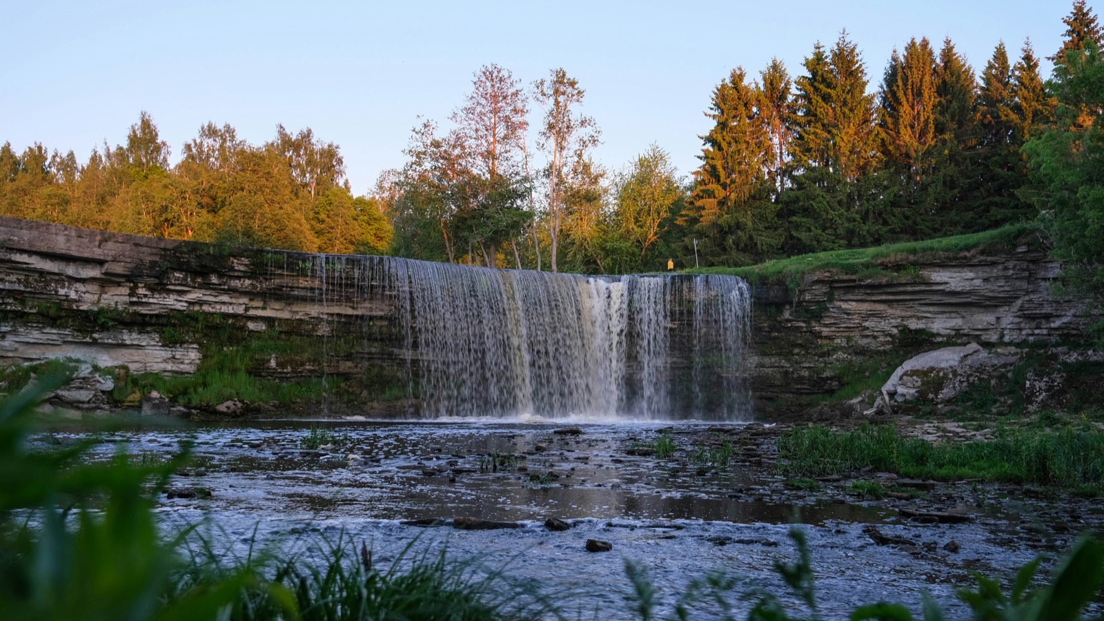 Jägala waterfall in Estonia, framed by autumn trees